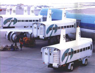 Electric vehicles used to transfer passengers between the terminal and the aircraft, as currently made by Quebec-based company Moody Systems