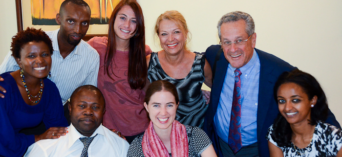 Penny and Gordon Echenberg (upper right) with some of the Echenberg fellows in Kigali.