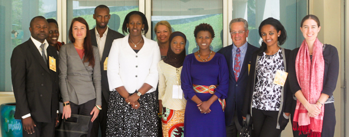 The group with Rwandan First Lady Janet Kagame (wearing the white jacket)