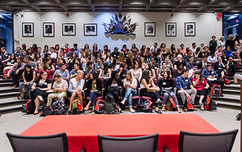 Students, faculty and staff waiting for the Dean's Welcome Speech