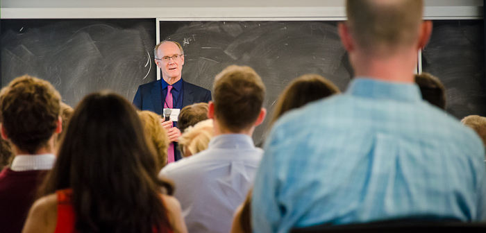 Justice Crampton speaking to the audience of judges and students